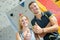 Friends ready for rock climbing in indoor gym