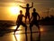 Friends silhouette at the summer beach