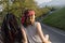 Friends Sitting on The Roof of the Van Traveling Road Trip