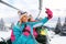 Friends skiers enjoying in the slopes and making selfie