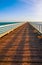 Friends Strolling Along The Pier