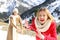 Friends throwing snowballs in a snowy mountain in winter