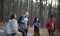 Friends walking through the forest