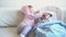 Friendship, family, infant, childhood concepts - Two little cute smiling toddler children baby relax playing on soft bed