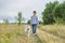 Friendship girls and dogs, teenager and pet husky walking outdoor