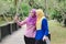 Friendship and happiness concept. portrait of smile young women selfie on wooden bridge