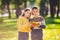 Friendship between siblings. Siblings together outside with bright colored background. Kids autumn portrait. Brother and sister