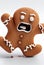 Frightened gingerbread man cookie isolated on a white background