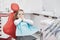 Frightened little girl at dentist office covered mouth with hands