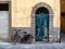 Fringed door and bike in Lucca