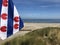 Frisian flag at the beach on Ameland island