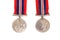 The front and back of a British World War Medal Featuring King George VI