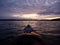 Front of canoe on peaceful Big Trout lake at sunrise. Minnesota, the Land of 10000 lakes, USA.