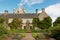 Front of Cawdor Castle with turret and drawbridge with bell and Stags Head Buckel Be Mindfull emblem. The castle has been known