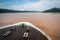 Front of a cruise ship on muddy Yangtze river during summertime China