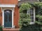 Front door of brick townhouse