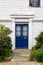 The front door and entrance to an old British home from the 1600's that was made from wood