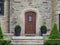 Front door of stone faced house