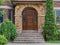 Front door with stone portico