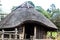 Front doorway view of replica viking house at botanic gardens