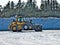 Front end loader takes short rest and tilts back on two wheels during job