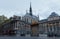 The front entrance of the Palais de Justice and Saint Chapel chapel in Paris, France in rainy summer evening.