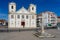 Front Facade of Sra do RosÃ¡rio Church with Stone Crucifix in Foreground,Barreiro.