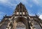 Front facade of St Lambert`s Church against blue sky located in Muenster, Germany