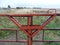 Front gate entrance locked to a farmer`s field