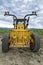 The front of a John Deere 772GP Grader parked at a farm field near Almo, Idaho, USA - June 12, 2022