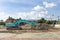 Front loader truck clearing concrete wast and steel at construction site