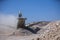 Front loaders moving sand in desert quarry