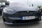 Front mask of modern 760 kW performance executive battery electric car Tesla S Plaid,