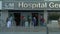 Front medium shot of hospital La Paz\\\'s main entrance in Madrid
