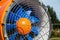 Front part of the snow cannon on a ski slope, detail of the protection mesh and the blades in a duct. Detail of ducted fan of a