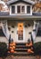 Front porch of a bungalow house has been decorated with spiders Halloween