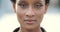 Front portrait of attractive young African American model woman with stylish fashion lush makeup close eyes, looking at