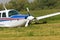 Front of a private airplane with a severely damaged propeller