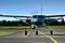 Front of propeller airplane shot with blue sky