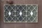 Front shoot of open brown colored metal door part with traditional turkish pattern