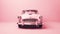 Front shot of barbie doll\\\'s pink classic car with barbie movie concept