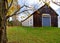 Front and side of Long Barn on a New England fall day