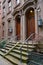 Front steps of elegant old brownstone style townhouses