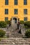 Front summer view of the old historic beautiful yellow orange Wenngarn Castle in Sigtuna Sweden.