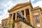 Front of the Theater Massimo Vittorio Emanuele with lion statue in Palermo, Italy.