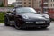 Front view of the 2006 sports porsche boxster s sedan prepared for sale and exhibited in the showroom with a polished shiny black