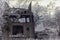 Front view of an abandoned, rusted tour bus in a forest, capture in infrared