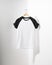 Front view of American Hipsters retro classic tshirt clothes. Blank template of vintage t-shirt hanging on a hanger on