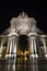 Front view of the Arco da Rua Augusta in Lisbon at night