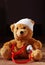 Front View of Bandaged Teddy Bear with Stethoscope